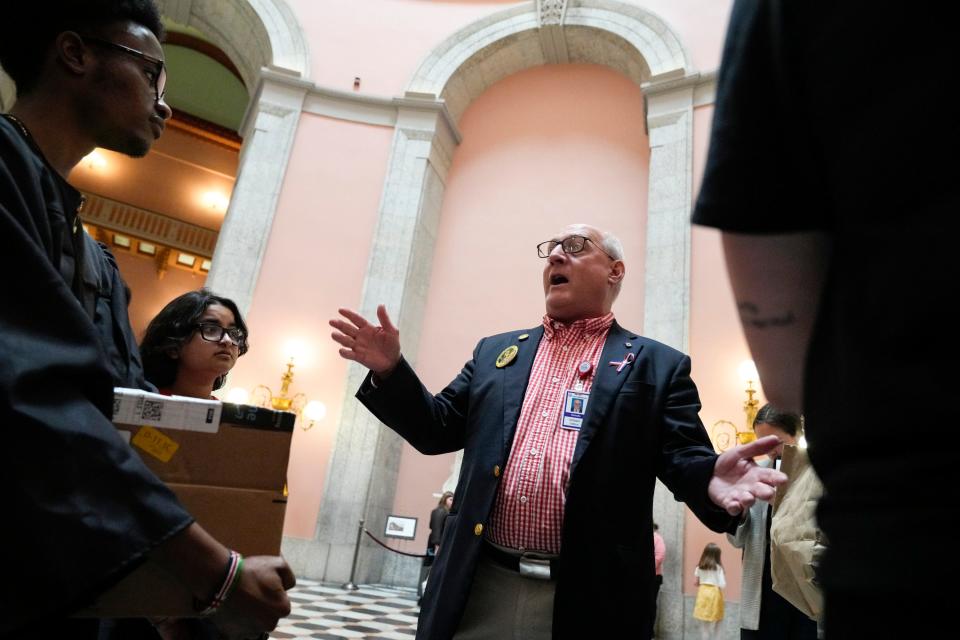 Jun 14, 2023; Columbus, Ohio, USA;  Ohio State Senator William DeMora (D-Columbus) speaks with student protestors after a protest led by the Ohio Student Association in opposition to Senate Bill 83 at the Ohio Statehouse. Senate Bill 83 is a higher education bill and would substantially alter how college campuses function with changes to collective bargaining agreements, diversity equity and inclusion policies and programs, and policies about controversial beliefs, among others.