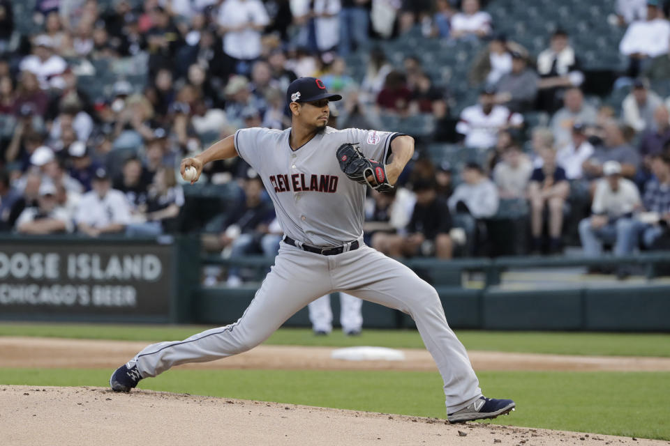 FILE - In this May 30, 2019, file photo, Cleveland Indians starting pitcher Carlos Carrasco throws against the Chicago White Sox during the first inning of a baseball game in Chicago. Carrasco, who was diagnosed with leukemia and was honored during Tuesday’s, July 9 All-Star Game, will throw a bullpen session and he’s confident he can overcome his condition and pitch again for Cleveland this season.(AP Photo/Nam Y. Huh, File)