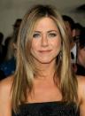 <p>Aniston goes longer and darker for winter.</p>