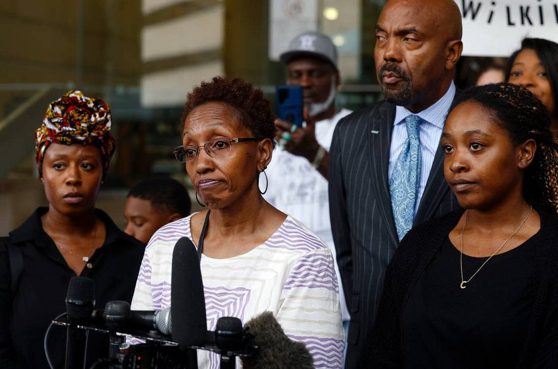 Jacqualyne Johnson, mother of Anthony Johnson Jr., center, is framed by daughters Janell and Chanel while speaking during a press conference outside of the Tim Curry Criminal Justice Center Tuesday, June 11, 2024, in Fort Worth. Anthony Johnson Jr.’s death in Tarrant County Jail was ruled a homicide by asphyxiation.