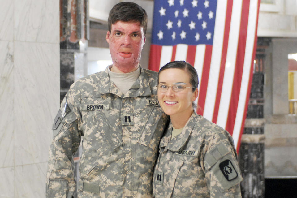 Capt. Sam Brown with his wife, Capt. Amy Brown, inside Camp Victory's Al Faw Palace.  (U.S. Army)