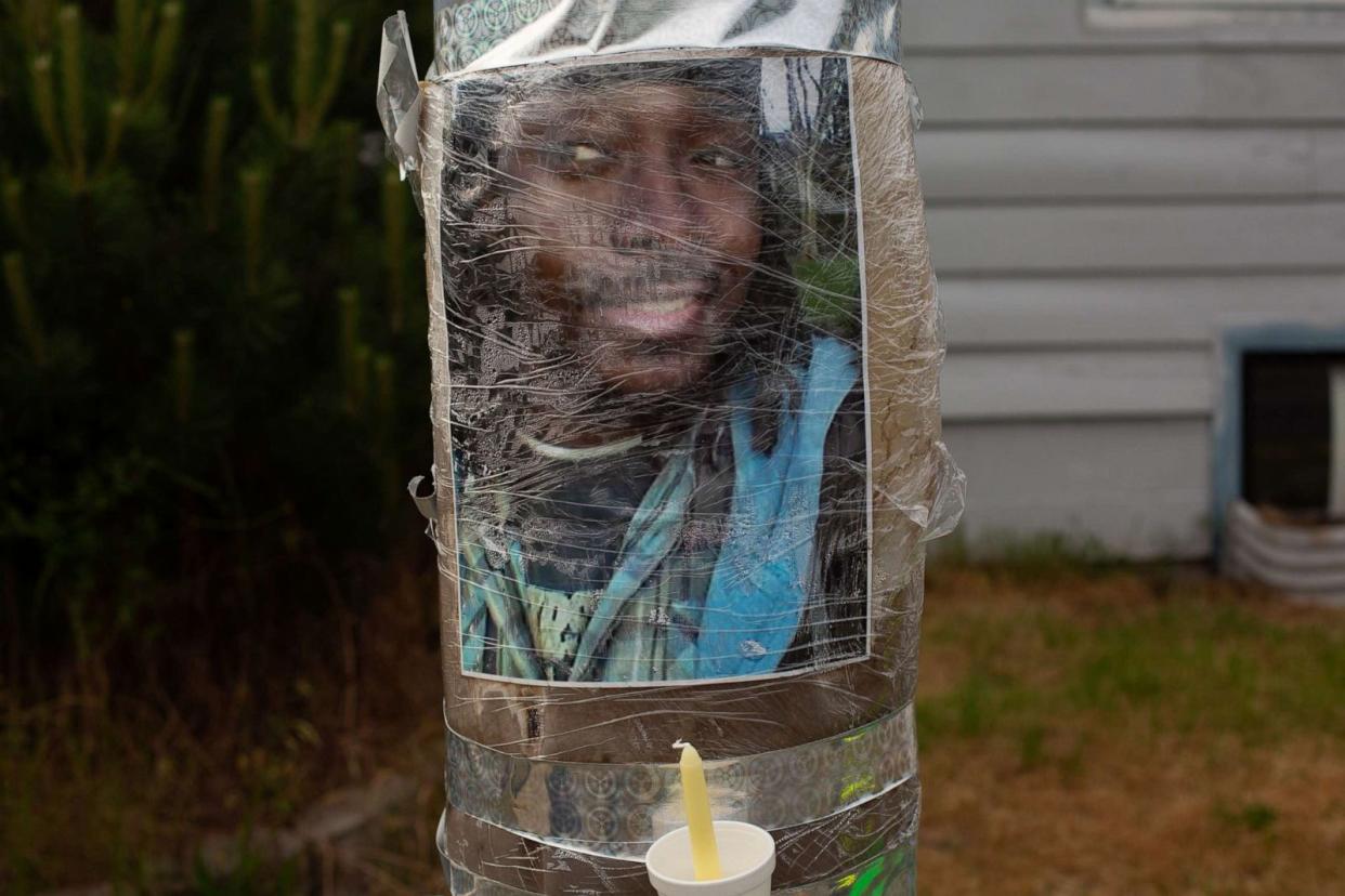 PHOTO: A photo of Manuel Ellis, a black man whose March death while in Tacoma Police custody was recently found to be a homicide, according to the Pierce County Medical Examiners Office, is seen near the site of his death, June 3, 2020, in Tacoma, Wash. (David Ryder/Getty Images)