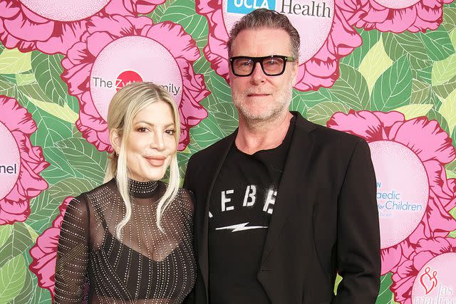 <p>Andrew J Cunningham/Getty</p> (L-R) Tori Spelling and Dean Mcdermott is pictured attending Luskin Orthopedic Institute For Children Gala at Universal Studios Hollywood on June 10, 2023 in Universal City, California.