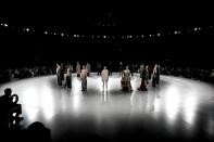 Models wear creations for Dior as part of the Menswear ready-to-wear Fall-Winter 2024-2025 collection presented in Paris, Friday, Jan. 19, 2024. (AP Photo/Christophe Ena)