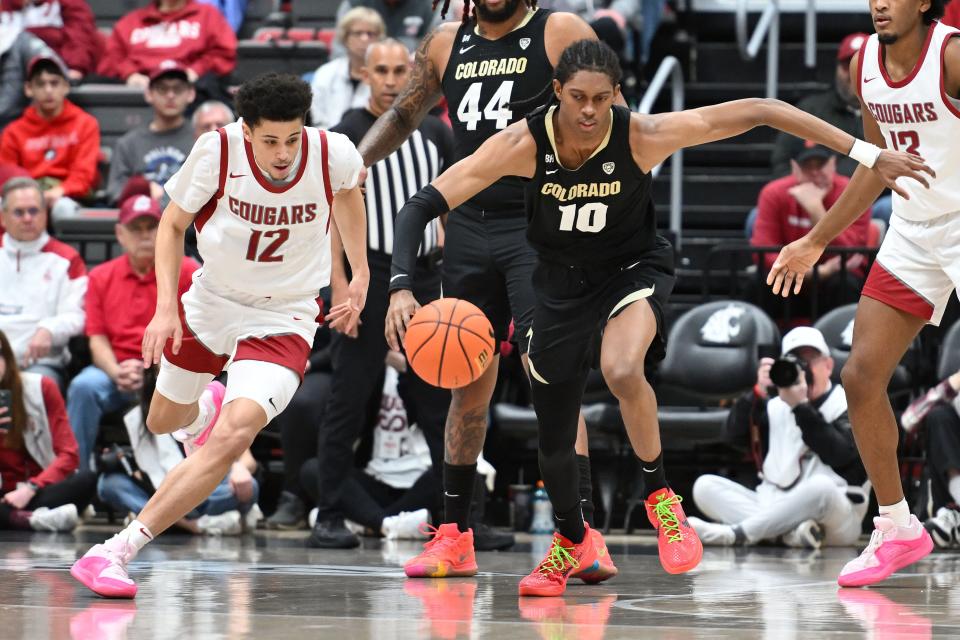 Colorado Buffaloes forward Cody Williams (10) chases after the ball against Washington State Cougars guard Isaiah Watts (12) in the first half at Friel Court at Beasley Coliseum Jan. 27, 2024, in Pullman, Washington.