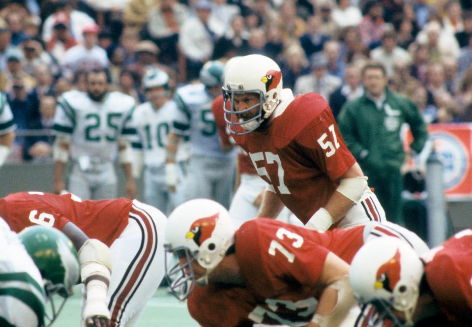 St. Louis Cardinals linebacker Mark Arneson (57) gets set before the snap during a game against the Philadelphia Eagles at Busch Stadium on Nov 20, 1977.