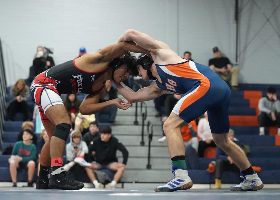 Fox Lane's Kevin Navarro wrestles Horace Greeley's Joshua Hametz in the 145-pound match in the quarter finals of the Section 1 Dual Meet Tournament at Horace Greeley High School in Chappaqua on Wednesday, December 14, 2022.