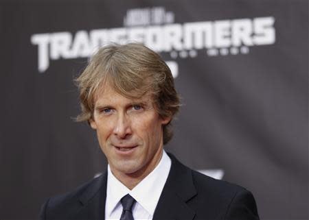 Director Michael Bay arrives for the premiere of Transformers: Dark of The Moon in Times Square in New York June 28, 2011. REUTERS/Lucas Jackson