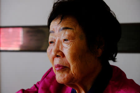 Lee Yong-soo, 90, one of less than 30 known surviving South Korean victims of JapanÕs wartime brothels, is interviewed in Daegu, South Korea October 30, 2018. Picture taken October 30, 2018. REUTERS/Josh Smith