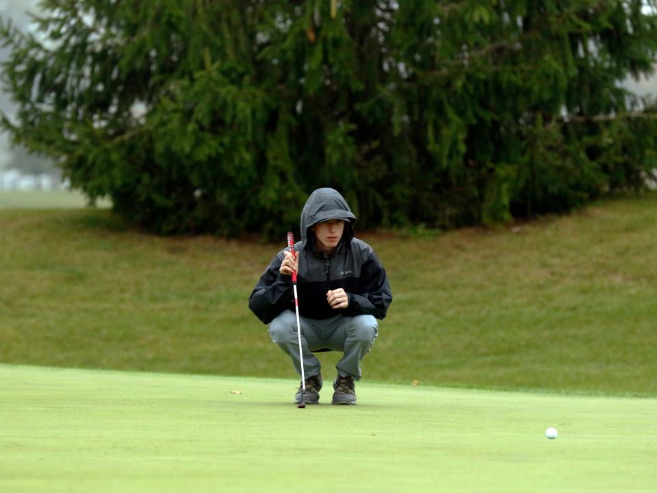 Sheridan senior Cody Hupp lines up a birdie putt on the 18th hole at the Division II state golf tournament on Saturday at NorthStar Golf Club in Sunbury. Hupp was playing in his final match as the Generals' lone senior.