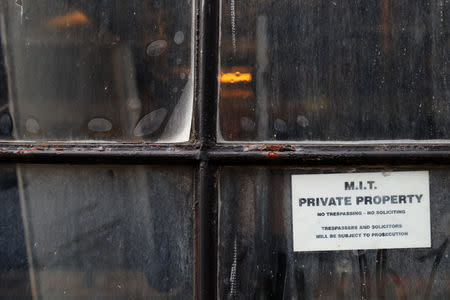 A sign hangs in the window of Building 43 marks MIT private property at the Massachusetts Institute of Technology in Cambridge, Massachusetts, U.S., November 21, 2018. REUTERS/Brian Snyder