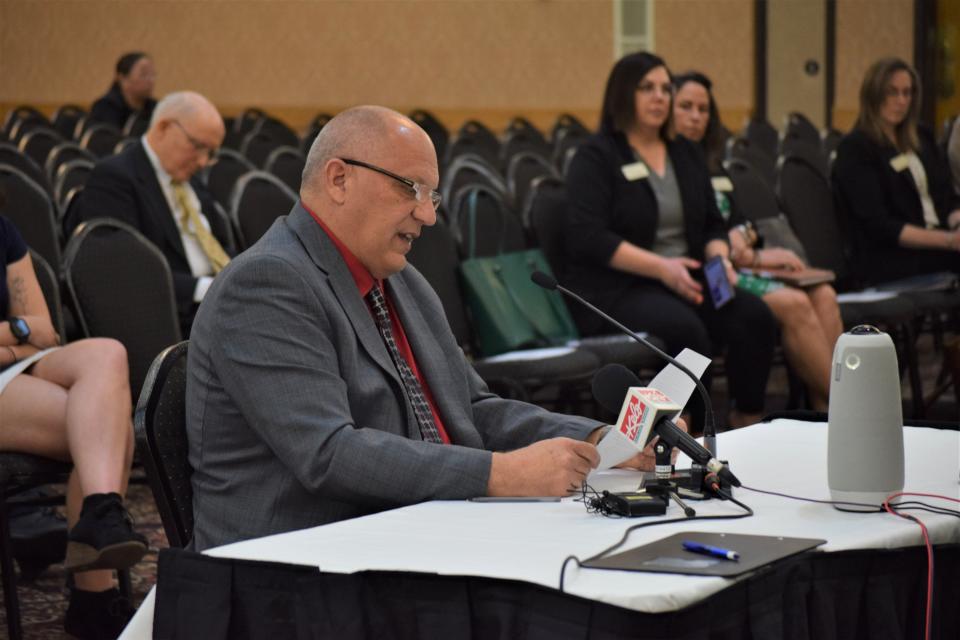 South Dakota Education Association president Loren Paul speaks against the proposed social studies standards at a Board of Education Standards hearing in Pierre on April 17, 2023.
