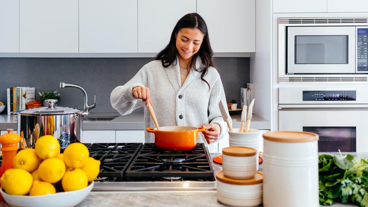 lady cooking in kitchen