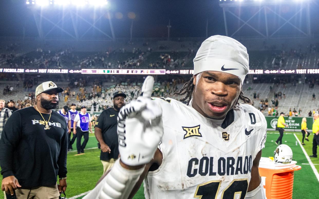 Travis Hunter celebrates after Colorado defeated rival Colorado State.