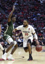 San Diego State guard KJ Feagin (10) drives past Colorado State guard Isaiah Stevens (4) during the first half of an NCAA college basketball game Tuesday, Feb. 25, 2020, in San Diego. (AP Photo/Denis Poroy)