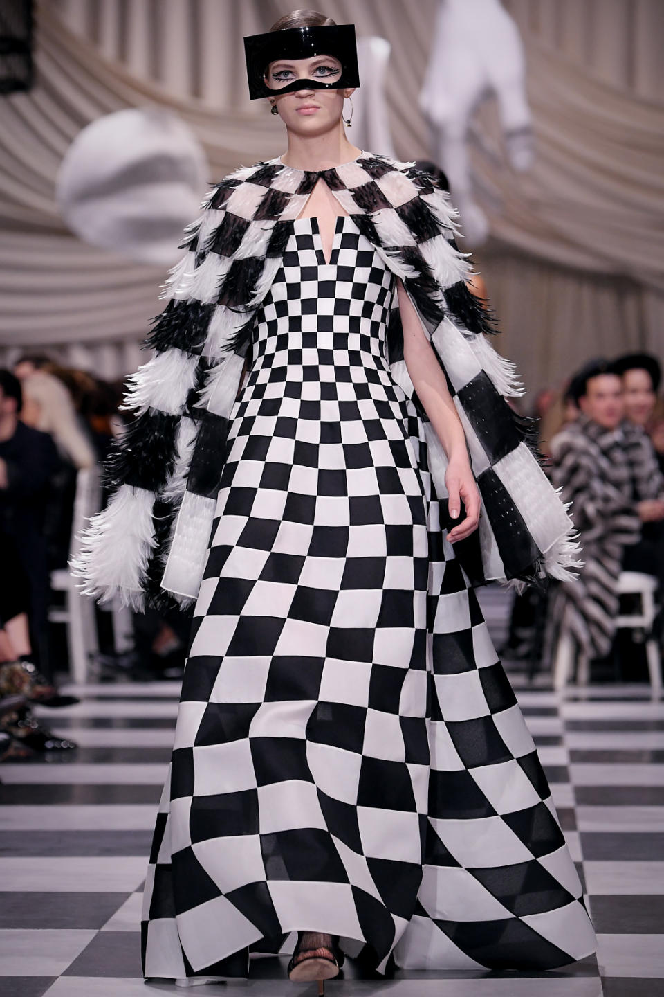 Checkered feather cape and gown