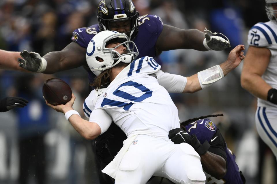 Indianapolis Colts quarterback Gardner Minshew (10) is hit in the end zone for a safety during the second half of an NFL football game against the Baltimore Ravens, Sunday, Sept. 24, 2023, in Baltimore. (AP Photo/Nick Wass)