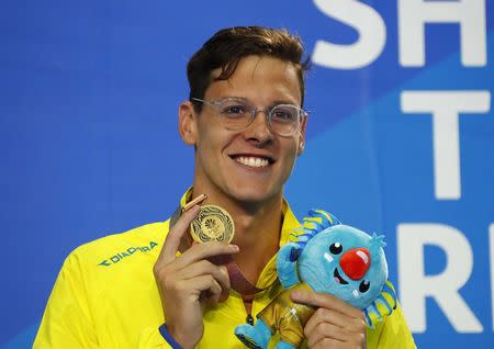 Swimming - Gold Coast 2018 Commonwealth Games - Men's 200m Backstroke - Medal Ceremony - Optus Aquatic Centre - Gold Coast, Australia - April 9, 2018. Gold medalist Mitch Larkin of Australia on the podium. REUTERS/David Gray