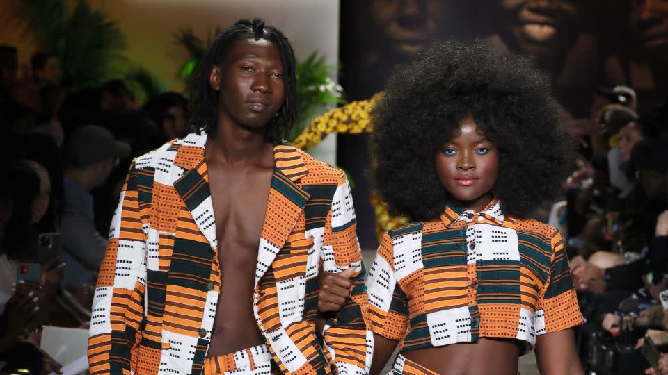 Studio 189 models came down the runway in pairs, strutting and dancing to the music as onlookers cheered. - Dia Dipasupil/Getty Images for NYFW: The Shows