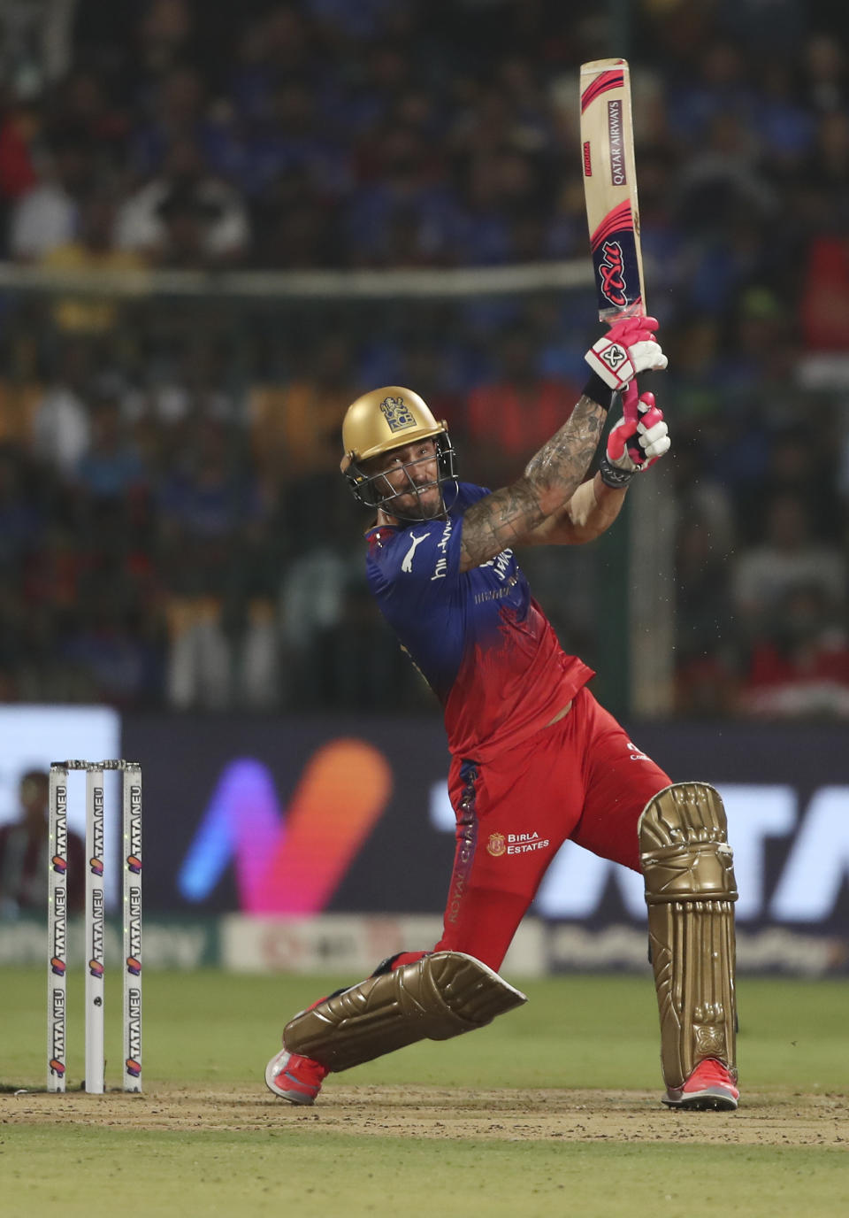 Royal Challengers Bengaluru's captain Faf du Plessis hist a six during the Indian Premier League cricket match between Royal Challengers Bengaluru and Gujarat Titans in Bengaluru, India, Saturday, May 4, 2024. (AP Photo)