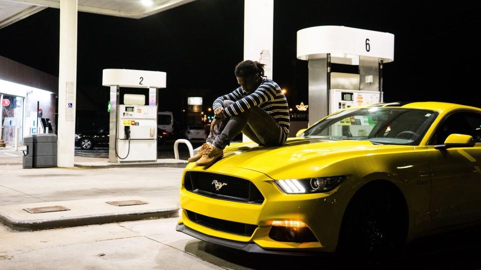 photo credit: <a href="https://www.pexels.com/photo/photo-of-man-sitting-on-hood-of-yellow-ford-mustang-parked-at-a-gas-station-2370850/" rel="nofollow noopener" target="_blank" data-ylk="slk:Pexels;elm:context_link;itc:0;sec:content-canvas" class="link ">Pexels</a>