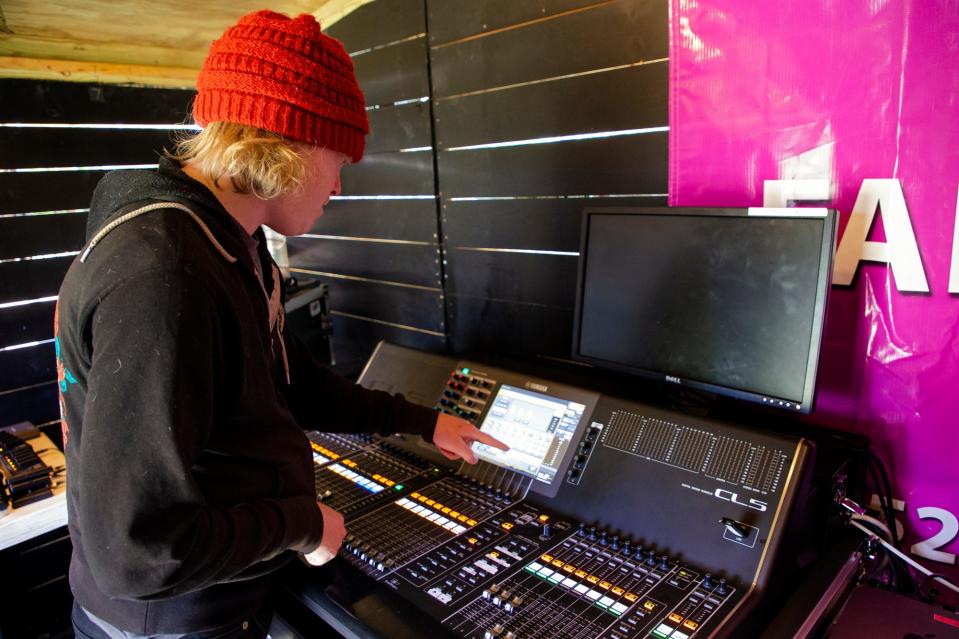 Sound designer Corey Ray sets up the soundboard for the Lyric Theatre's outdoor production of "A Christmas Carol" at Harn Homestead in Oklahoma City, Okla. on Friday, Nov. 5, 2021. 