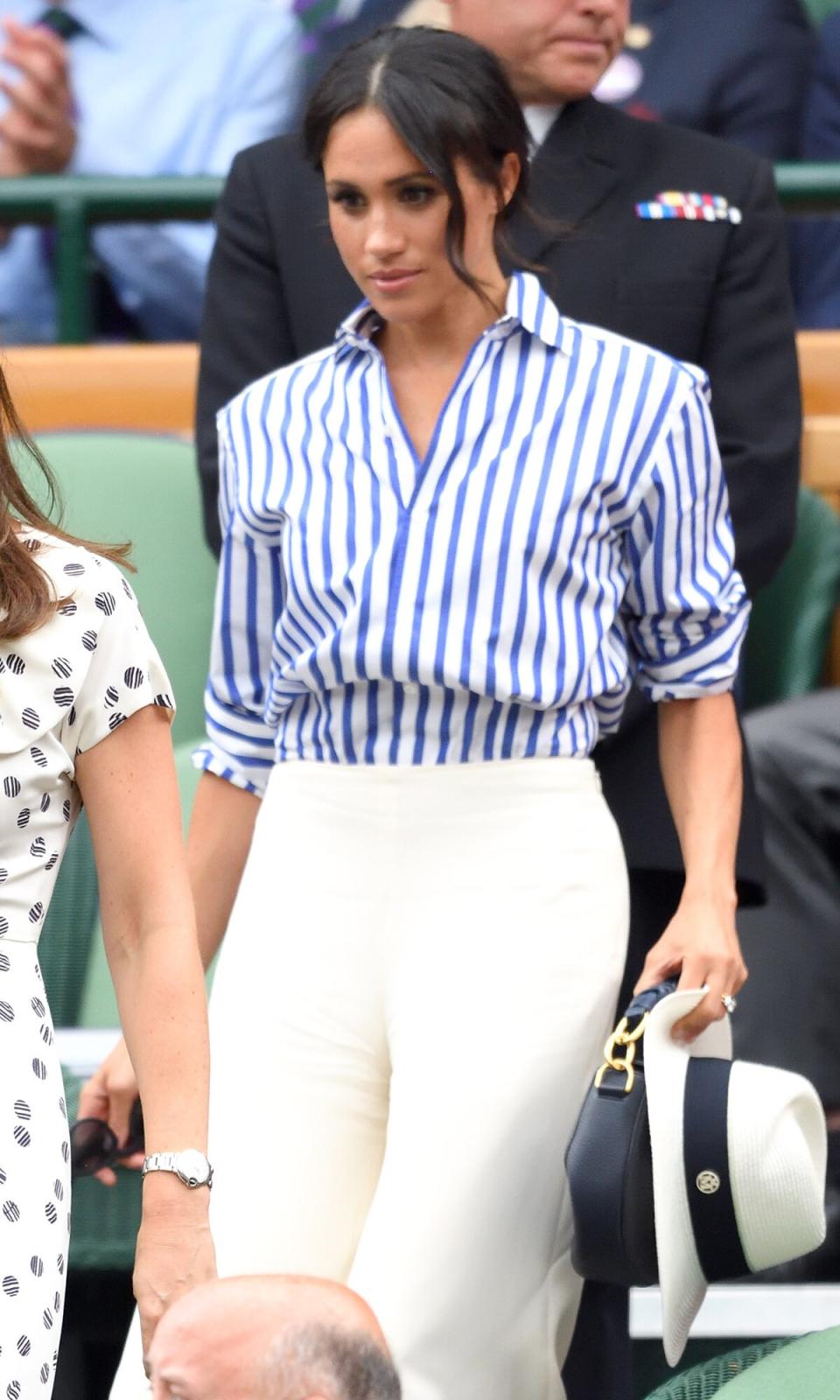 Meghan, Duchess of Sussex attend day twelve of the Wimbledon Tennis Championships at the All England Lawn Tennis and Croquet Club on July 14, 2018 in London, England