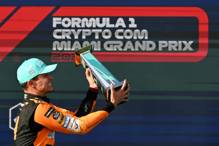 McLaren's British driver Lando Norris celebrates with his trophy after winning the Miami Grand Prix on Sunday. (Jim WATSON)