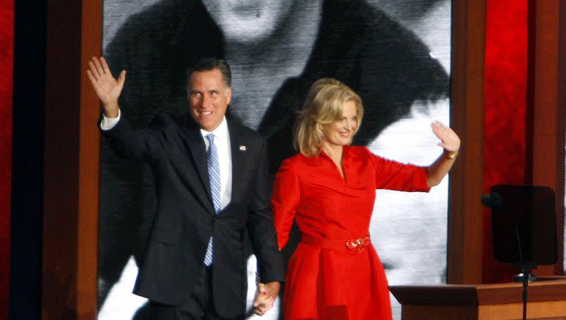 Mitt Romney comes out onto the stage after his wife, Ann Romney, spoke about America, women, and her relationship with her husband at the Republican National Convention at the Tampa Bay Times Forum on Aug. 28, 2012.