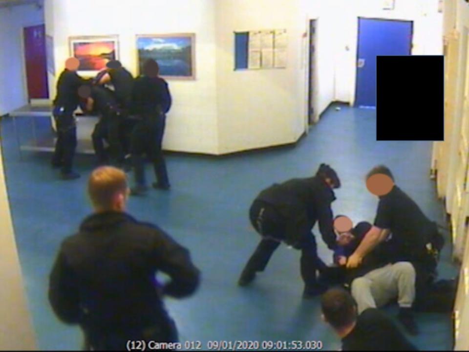 Prison officers restraining two inmates after an alleged terror attack at HMP Whitemoor in Cambridgeshire on 9 January 2020Metropolitan Police