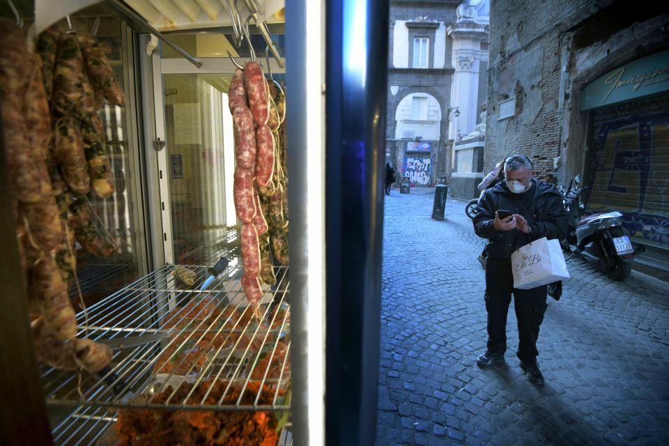 Police in southern Italy patrol markets to prevent people from stealing food.