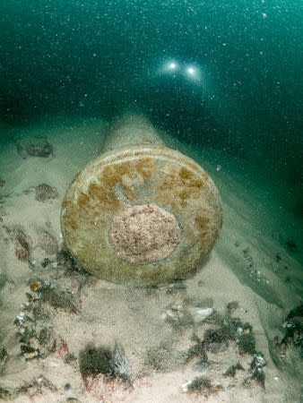 Divers are seen during the discovery of a centuries-old shipwreck, in Cascais in this handout photo released September 24, 2018. Augusto Salgado/Cascais City Hall/Handout via Reuters