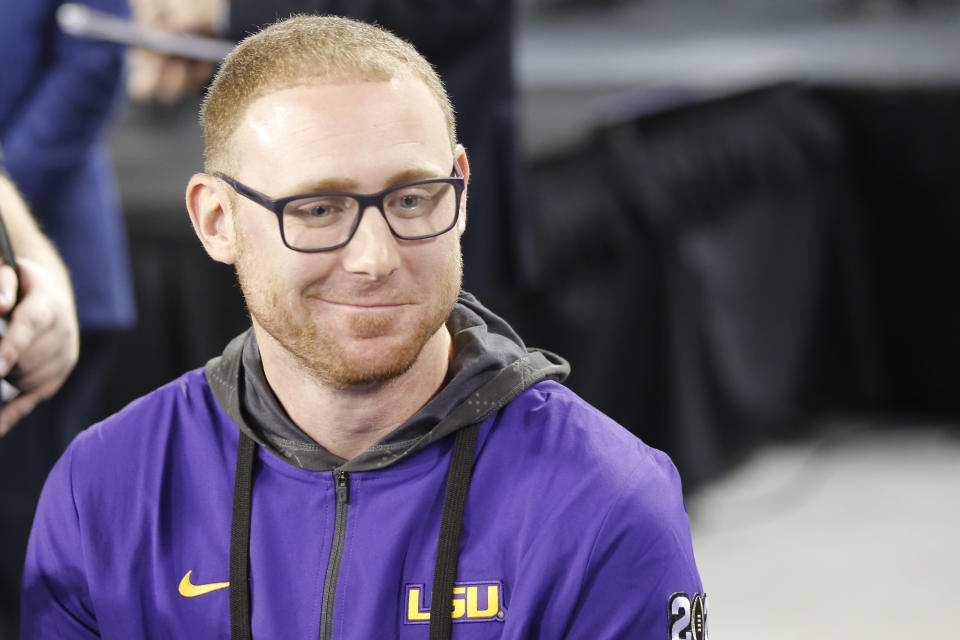 LSU passing game cordinator Joe Brady speaks during media day for NCAA College Football Playoff national championship game Saturday, Jan. 11, 2020, in New Orleans. Clemson is scheduled to play LSU on Monday. (AP Photo/Gerald Herbert).