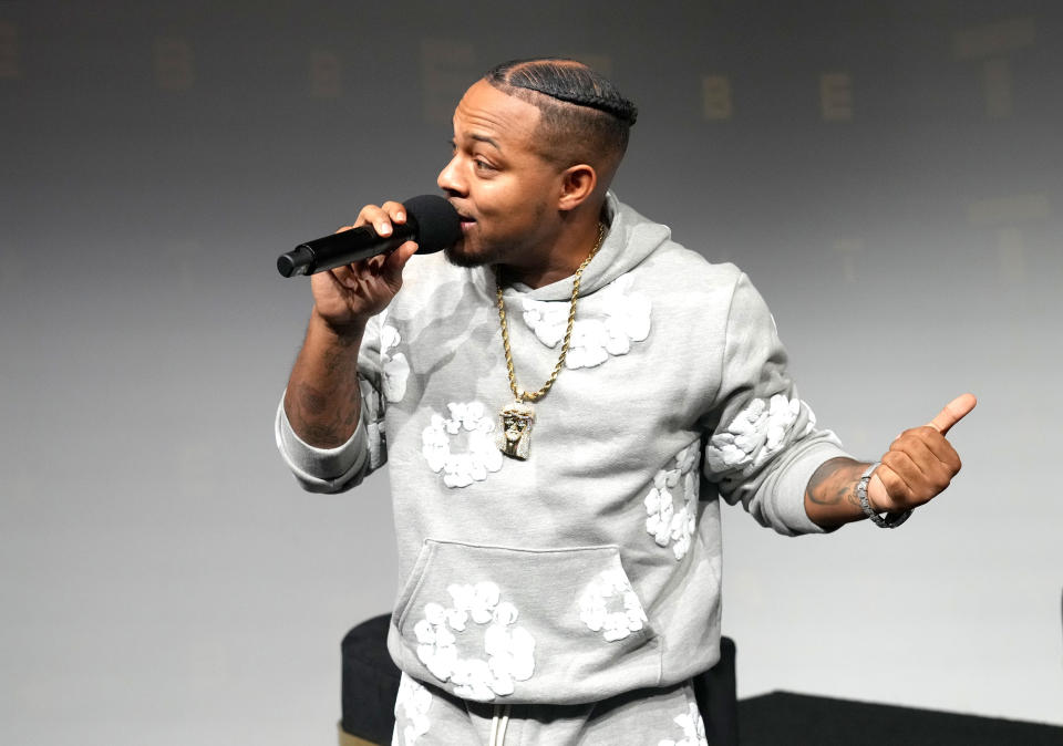 Bow Wow Holding Mic