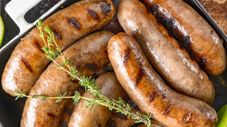 Cooked sausages in a pan