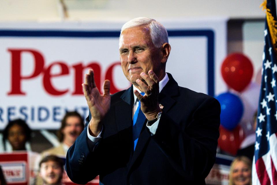 Former Vice President Mike Pence claps after his wife, Karen Pence, finishes her remarks during a campaign announcement rally at the FFA Enrichment Center on the DMACC campus on Wednesday, June 7, 2023, in Ankeny.