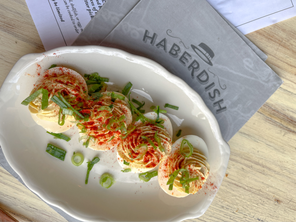 Haberdish offers up their smoked deviled eggs with an optional trout topping. Haberdish