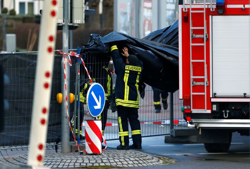 Firefighter secures the area the day after a car ploughed into a carnival parade injuring several people in Volkmarsen