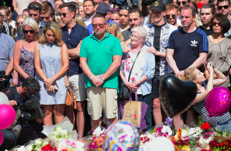 Crowds gathered to pay their respects to the victims of the attack (PA)