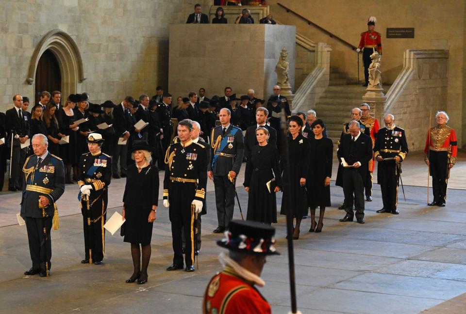 King Charles III, Anne, Princess Royal, Camilla, Queen Consort, Vice Admiral Sir Timothy Laurence, Prince William, Prince of Wales, Prince Harry, Duke of Sussex, Sophie, Countess of Wessex, Catherine, Princess of Wales, Meghan, Duchess of Sussex, Prince Edward, Duke of Kent and Prince Michael of Kent pay their respects inside the Palace of Westminster for the Lying-in State of Queen Elizabeth II