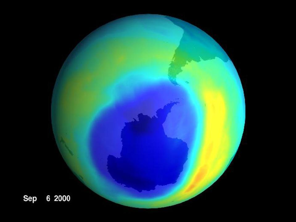 ozone layer hol in a green global earth view showing Antarctica with a giant blue patch over it