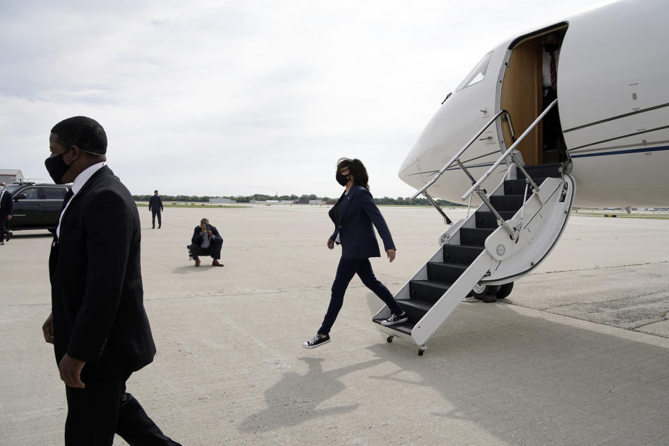 Democratic vice presidential candidate Sen. Kamala Harris, D-Calif., steps from the plane as she arrives Monday, Sept. 7, 2020, in Milwaukee. (AP Photo/Morry Gash)