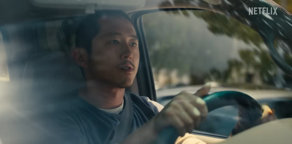 Steven Yeun as Danny driving his truck in "Beef"