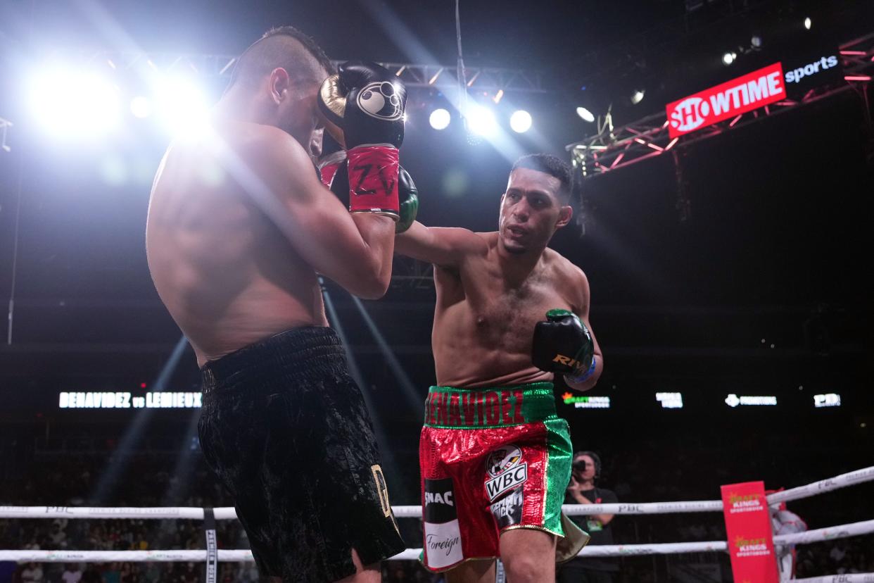 May 21, 2022; Glendale, Arizona, USA; David Benavidez (red trunks) and David Lemieux (black trunks) box during their Interim WBC World Super Middleweight Championship boxing match during a Premier Boxing Champions card at Gila River Arena. Mandatory Credit: Joe Camporeale-USA TODAY Sports