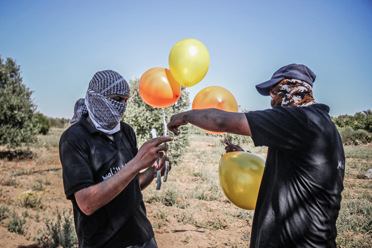 Image: Cross-Border Hostilities Reignite With Incendiary Balloons And Airstrikes (Fatima Shbair / Getty Images)