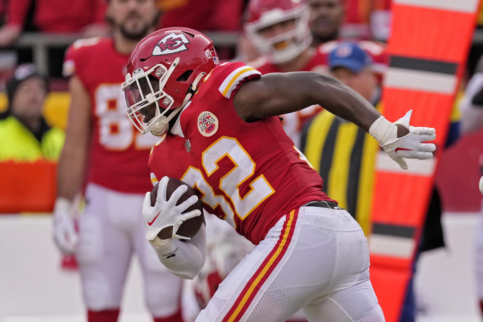 Kansas City Chiefs linebacker Nick Bolton runs the ball during the second half of an NFL football game against the Denver Broncos Sunday, Jan. 1, 2023, in Kansas City, Mo. (AP Photo/Charlie Riedel)