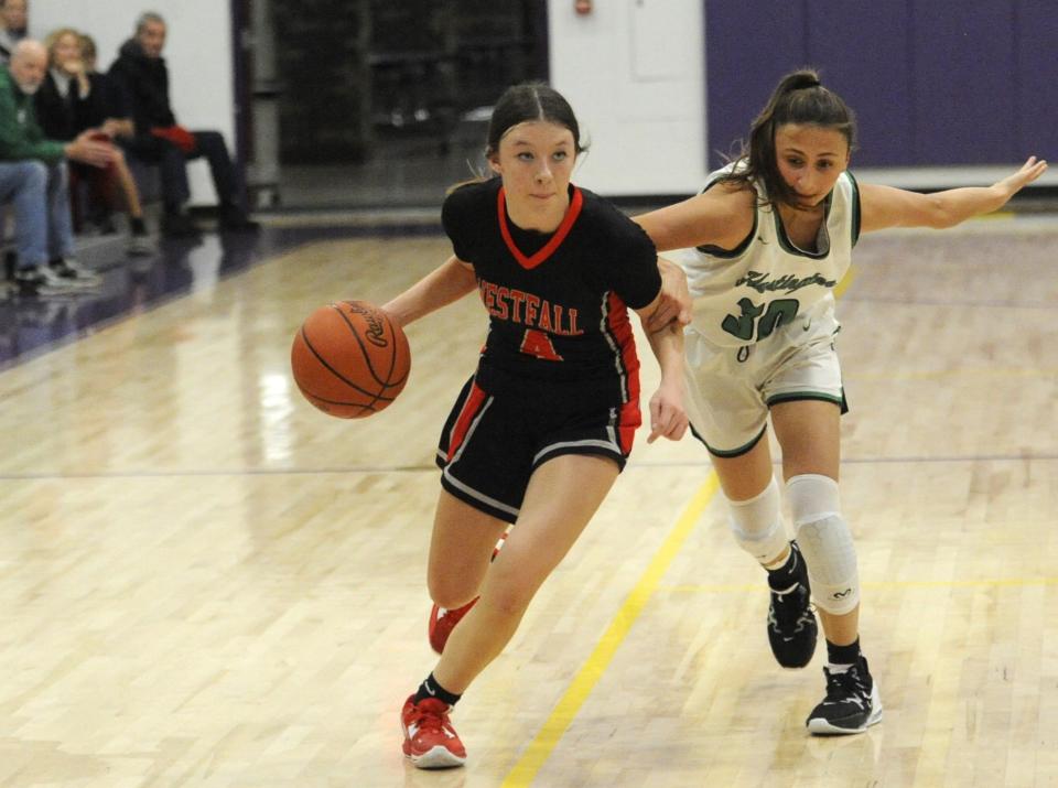 Westfall's Kyleigh Mercurio (#4) drives toward the paint during the Mustangs' preseason scrimmage against the Huntington Huntsmen on Nov. 17, 2023 at Unioto High School.