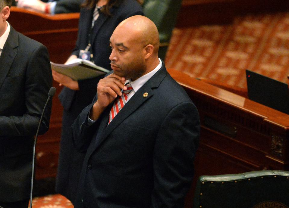 Rep. Justin Slaughter, D-Chicago, listens to questions put on him during the debate of House Bill 1095 on the house floor Thursday Dec. 1, 2022.