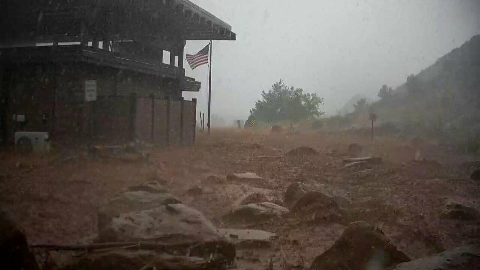 A flash flood hits Zion National Park on Tuesday, June 30, 2021.