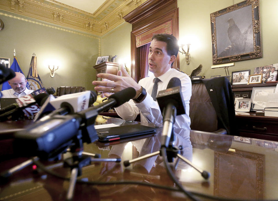 Addressing members of the media for the first time after failing to win re-election in the 2018 race, Wisconsin Governor Scott Walker addresses members of the media from his office in Madison, Wis., Thursday, Nov. 15, 2018. (John Hart/Wisconsin State Journal via AP)